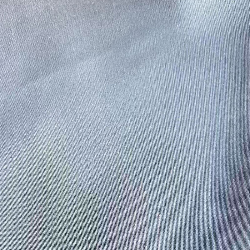 W jaki sposób rozciągliwa tkanina satynowa poprawia nowoczesny design odzieży?